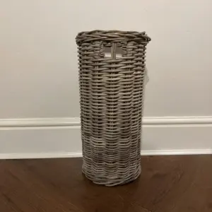 Natural wicker / rattan umbrella stand shown empty